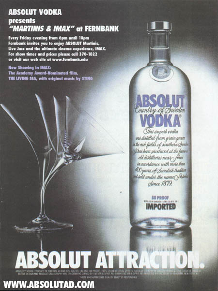 Glass bending towards bottle.  Special ad for IMAX theater.