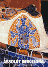 Mosaic tiles on a fountain in the shape of a bottle.