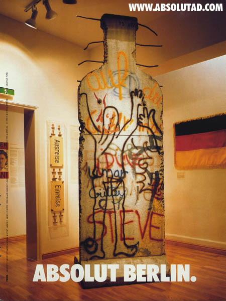 Piece of what used to be the Berlin wall in the shape of a bottle.