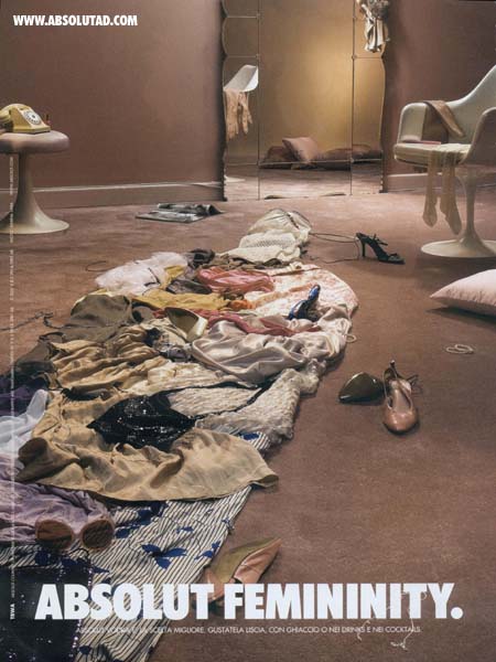 Women's clothing thrown on floor.