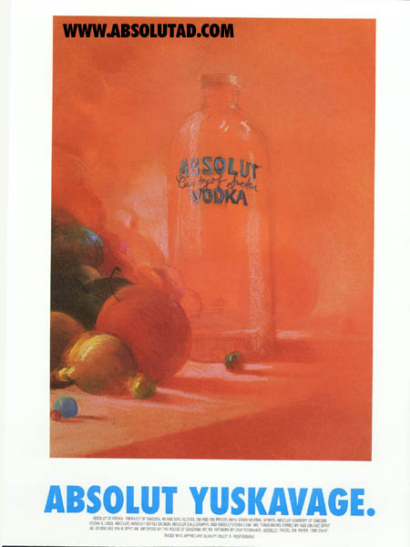 orange painting with fruit and bottle